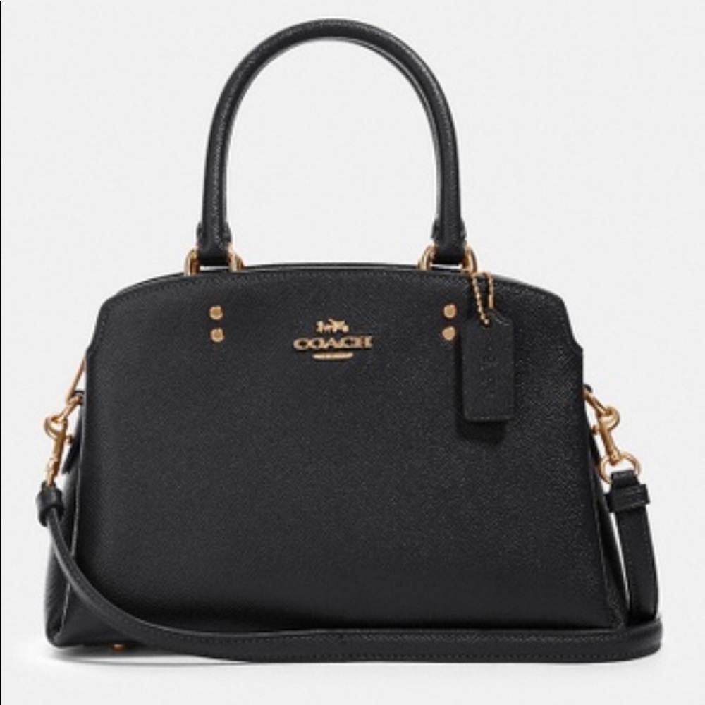 New barely used Medium Sized Coach bag